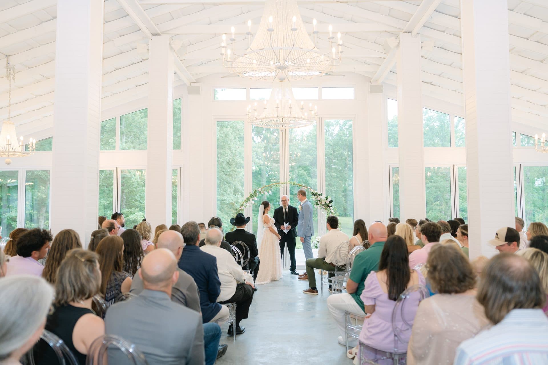 A ceremony beneath the Pavilion chandeliers