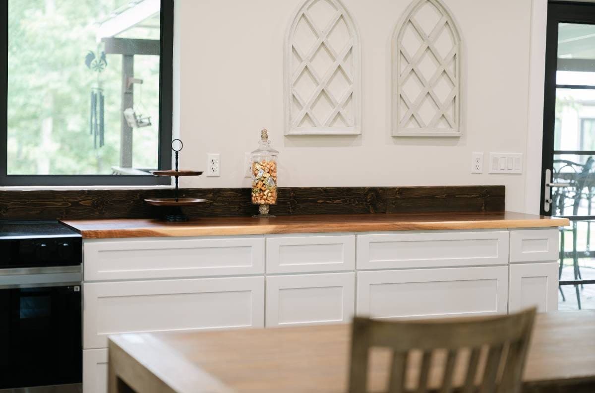 Cathedral windows and styled kitchen inside the cottage